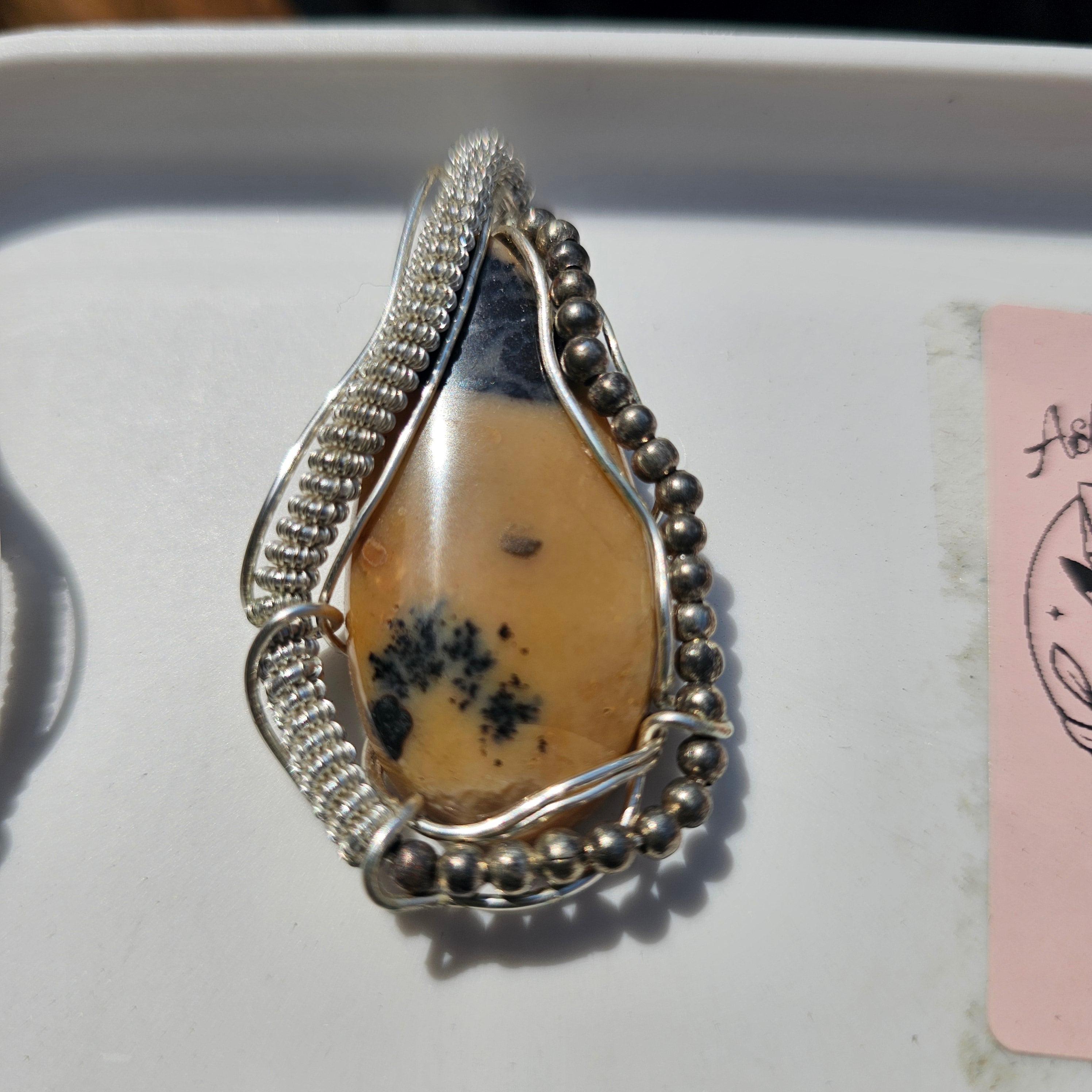 Hand wrapped pendent dentrite