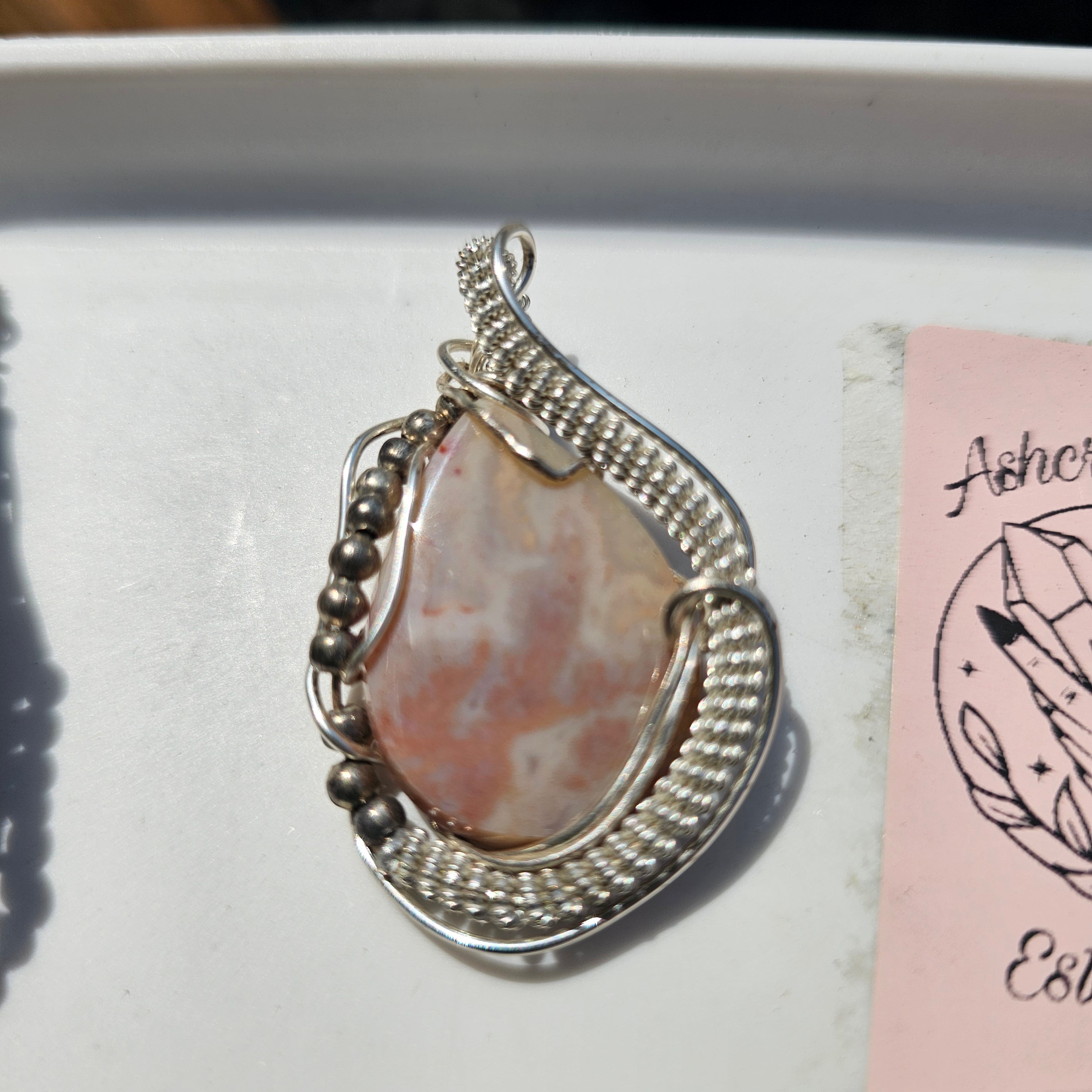 Hand wrapped pendent pink agate
