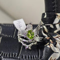 Peridot bird ring 15u
